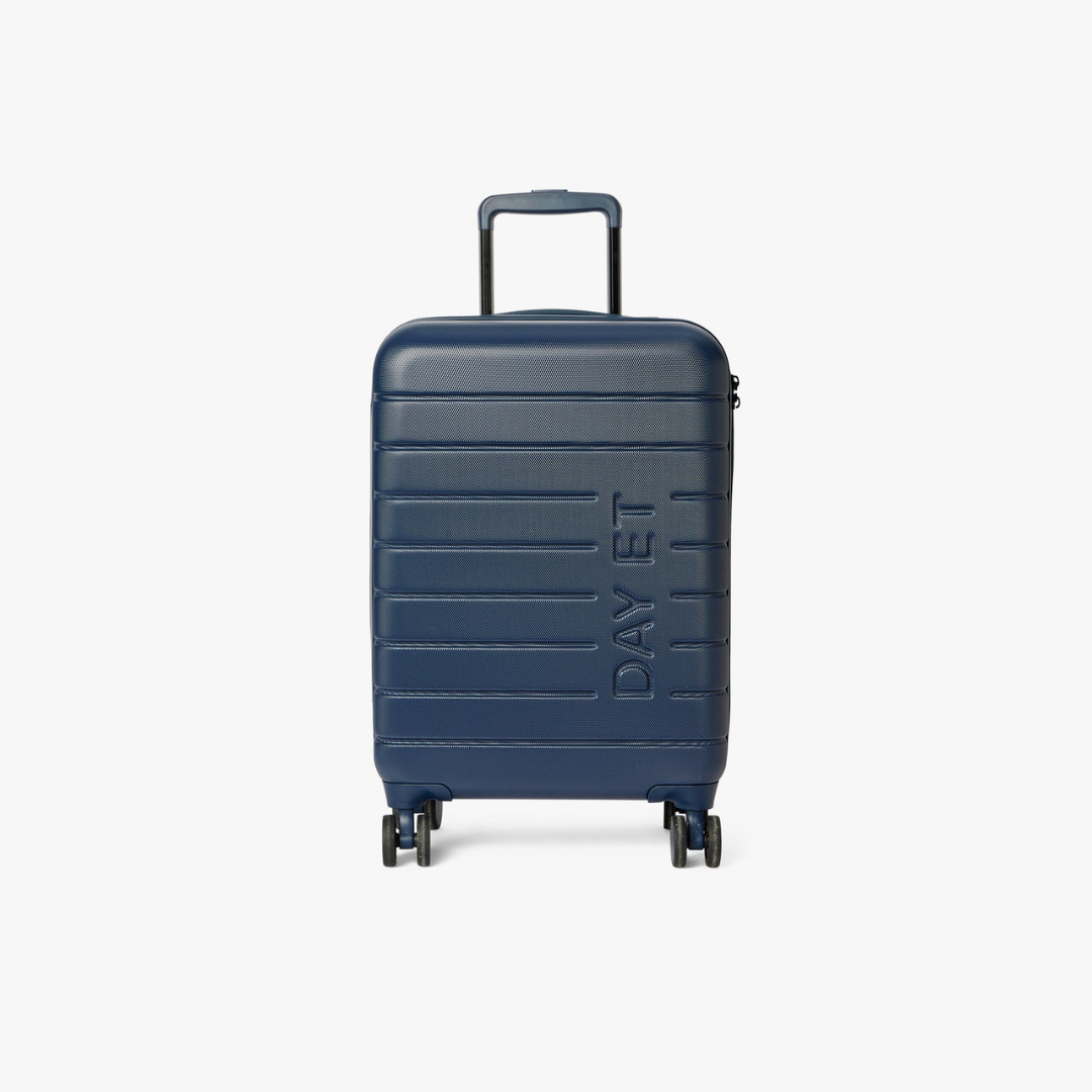 Blue suitcase with 'DAY ET' branding on a white background